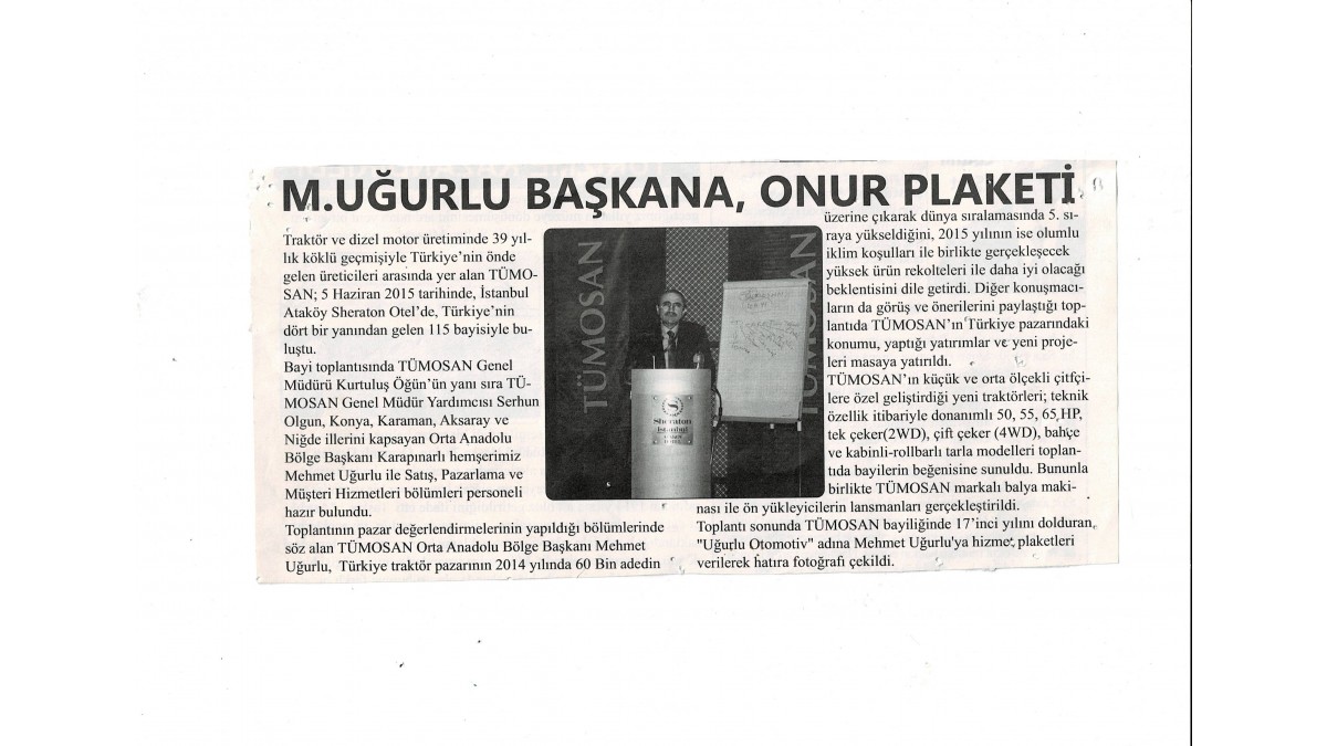 M.UĞURLU Başkana,Onur Plaketi